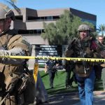 Motel Takedown Raises Troubling Gaps Tactical police officers behind yellow caution tape at an outdoor scene