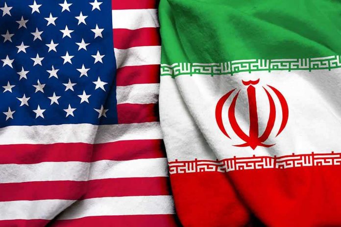 shutterstock_1041239128 United States and Iran flags side by side