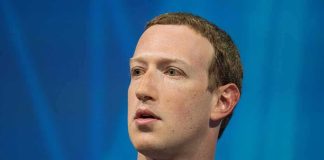 Massive Meta Payout — But No Guilt? man speaking on stage with lapel microphone