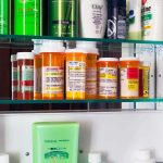 Universal HealthCare, Costly Waits — Millions Stalled Medicine cabinet with prescription bottles and toiletries
