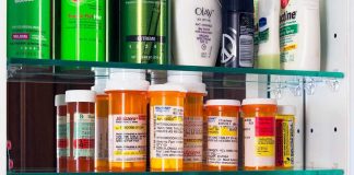 Universal HealthCare, Costly Waits — Millions Stalled Medicine cabinet with prescription bottles and toiletries
