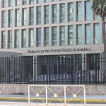 Embassy Locks Down Mexicali — Ominous Silence Embassy building behind tall black security fence