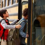 Highway 49 School Bus Meltdown Sparks Arrest Children boarding a yellow school bus