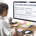 Freshmen Can’t Do Algebra? University Revolts Student completing a college application on a desktop computer