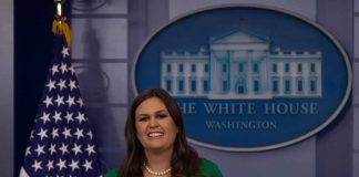 Military Families Win Real Clout woman speaking at a press podium in the White House briefing room