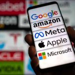 Jury Showdown: Meta’s Addiction Playbook Hand holding phone displaying tech company logos