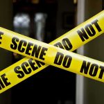 Campus Tragedy, Kratom Twist Yellow crime scene tape crossing a doorway