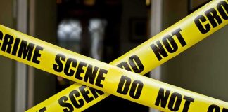 Campus Tragedy, Kratom Twist Yellow crime scene tape crossing a doorway