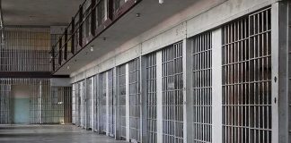 Last-Minute Halt Shocks Death Chamber prison cell block with metal barred doors