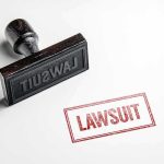 Crime Claims Clash Sparks $5B Showdown Rubber stamp with red lawsuit imprint on white paper