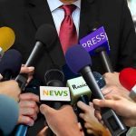 CBS Meltdown: 60 Minutes Icon Axed Press microphones surround a suited spokesperson