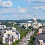 Congress Slaps Wall Street Landlords United States Capitol building with city street and skyline