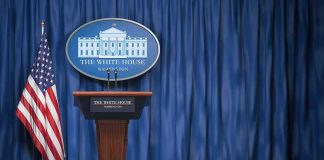 Showdown: Trump Welcomes China’s Xi Jinping White House press briefing podium with U.S. flag and blue curtain