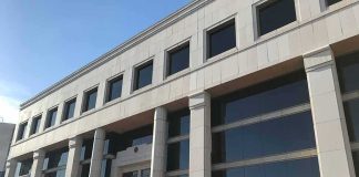Property Seizures Floated — Maine Meltdown Modern office building with columns and reflective windows