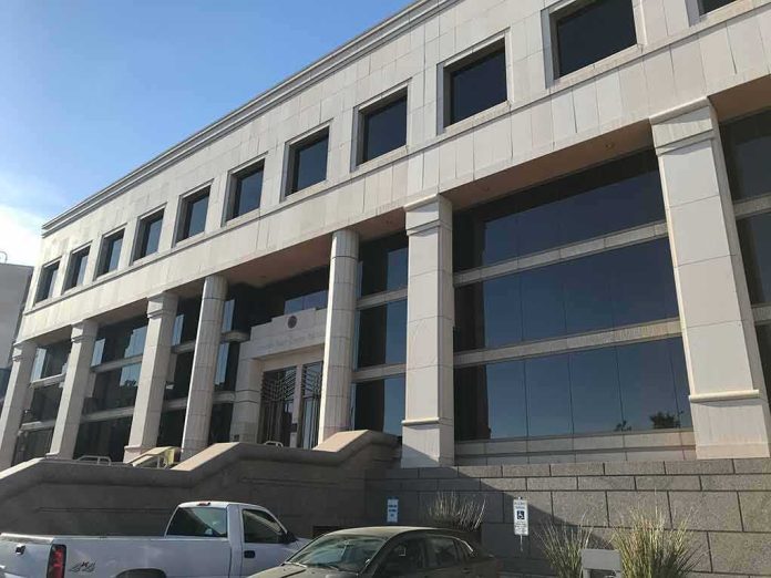 shutterstock_1405012190 Modern office building with columns and reflective windows