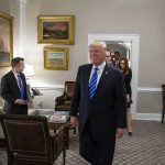 Vanity Fair Bombshell Sparks West Wing Meltdown Donald Trump walks through an office with Sean Lawler nearby and Mariano Rajoy following behind