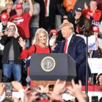 Bribe Or Breakthrough? Trump’s $5,000 Tease political rally with two speakers at a podium