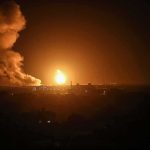 Putin’s Backyard Ablaze — Refineries Down nighttime explosion over a city skyline