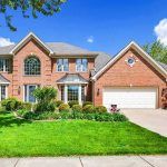 Internet Shields Killer, Kids Forgotten Brick suburban house with two-story facade and three-car garage
