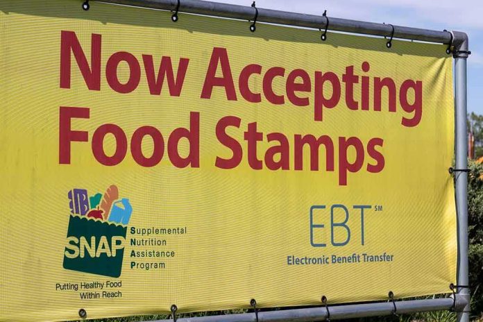 Yellow banner announcing acceptance of food stamps and EBT