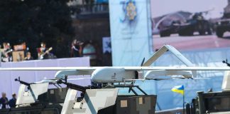 1,000 Drones Crash Russia’s Big Day Military drone mounted on armored vehicle