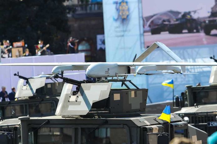 shutterstock_2034373115 Military drone mounted on armored vehicle