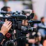 Armed Impostor Breaches Trump Perimeter Video cameras on tripods at a media event