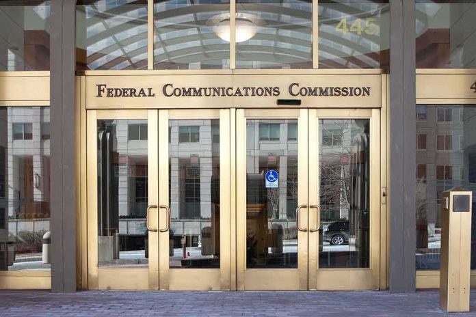 Federal Communications Commission building entrance with gold doors