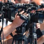 Qatar Jet Upends Air Force One Plans television cameras on tripods at a media event