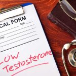 Military’s Testosterone Crackdown Sparks Doctor Uproar medical form on clipboard with stethoscope and glasses