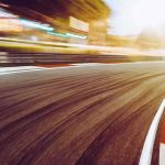 Stunning Nascar Kyle Busch Passing — What Are They Hiding? race track curve at sunset with motion blur