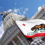 Nationwide Billionaire Tax Bombshell California state flag in front of a white domed capitol building
