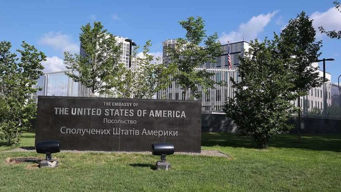 U.S. embassy sign in landscaped grounds