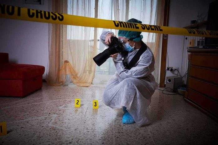 forensic photographer documenting indoor crime scene