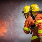 Hero Firefighter Exposed As Alleged Arsonist Firefighters spraying water on a blaze