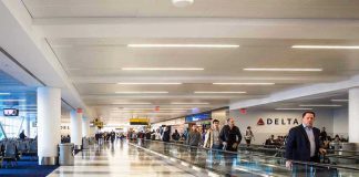 Handcuffs at Gate: Actress in Crisis? Airport terminal with passengers on a moving walkway