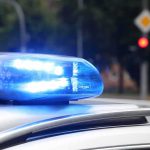 Police Chief vs. Mayor – Explosive Allegations Police car blue siren light flashing