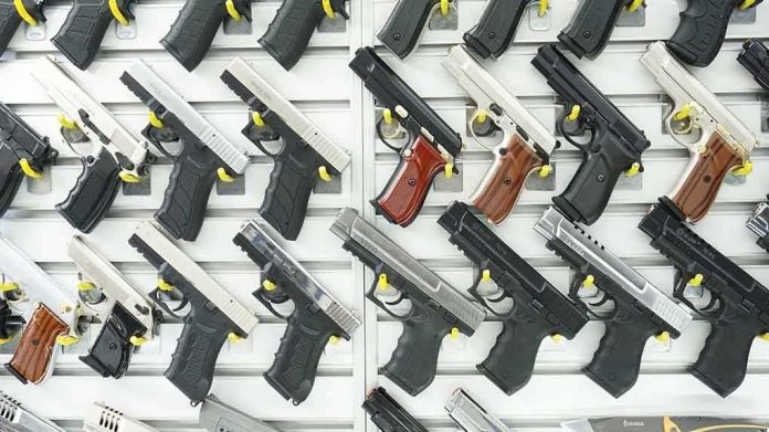 Wall display of handguns in a gun store