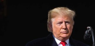 Trump Drops Bombshell Advice on Press Chief Donald Trump at a podium with a microphone