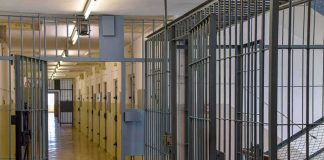 Arrest After Chilling Home Tour Prison corridor with barred doors