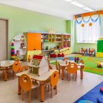 English Teacher Jailed For Assaulting 22 Children! Preschool classroom with colorful furniture and toys