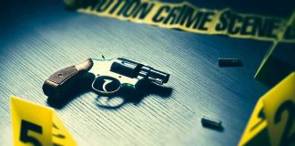 Teen’s Gun Traced – Now What For Mom? Revolver on a table at a crime scene with evidence markers