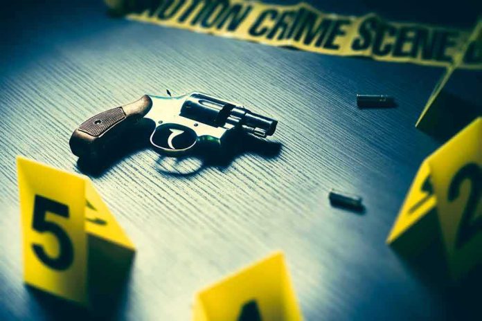 Revolver on a table at a crime scene with evidence markers