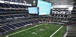 Stadium Rappel Horror Stuns Fans American football stadium interior with large central video board